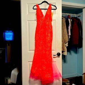 The person who wore this is 5 foot and a cup, and she wore 4 inch heels